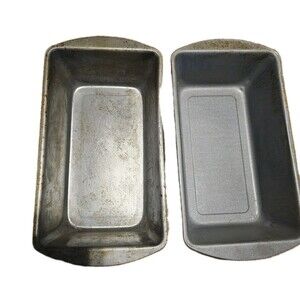 Two metal loaf pans